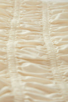 Women's Eden Smocked Top in the color Off White - Additional Laydown image