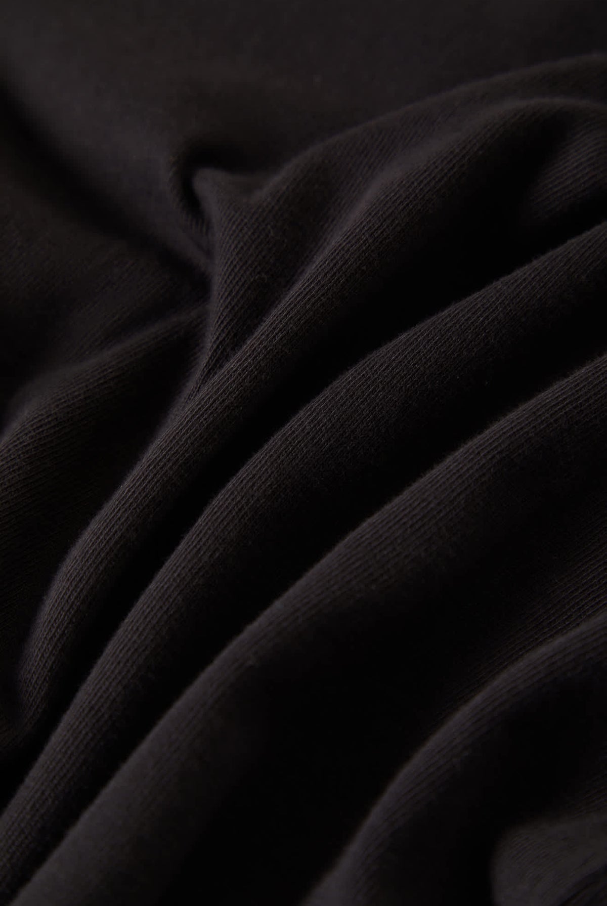 Women's Carefree Organic Garment Dye Slim L/S T-Shirt in the color Black - Additional Laydown image