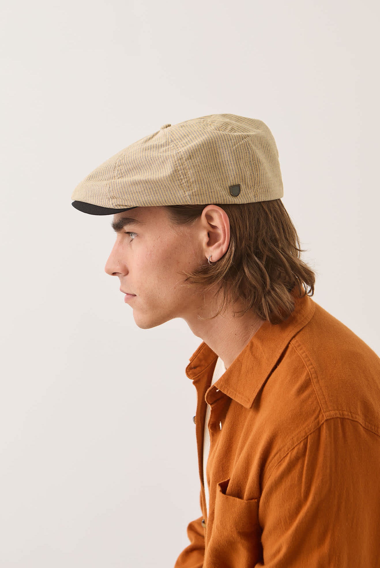 Unisex Hooligan Flat Cap in the color Khaki Stripe/Washed Black - Men's Side View