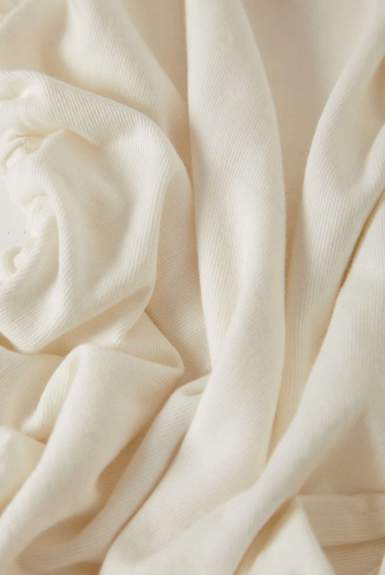 Women's Carefree Organic Garment Dye Cinch T-Shirt in the color Off White - Additional Laydown image