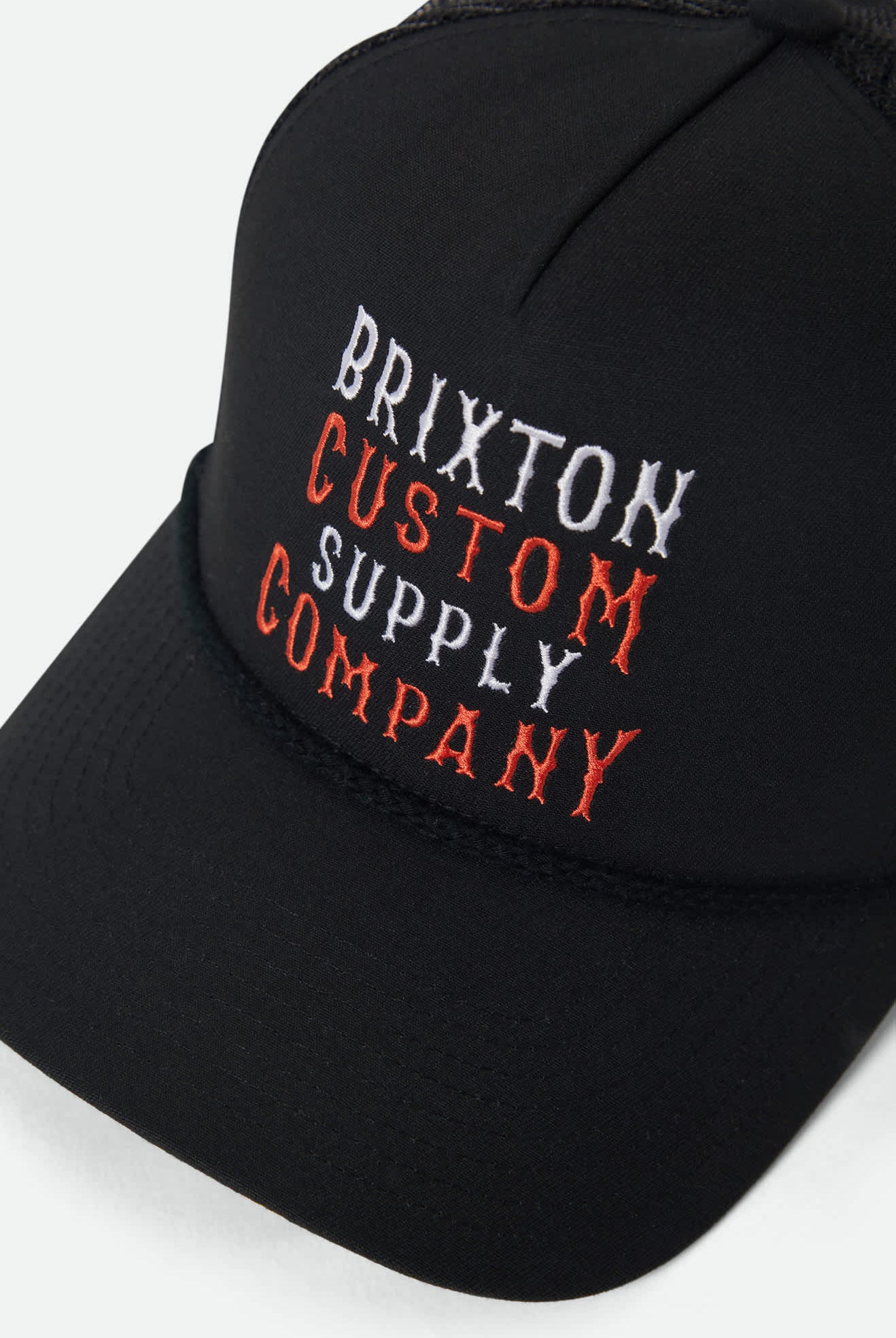 Unisex Wheaton NetPlus Trucker Hat in the color Black/Black - Additional Laydown image