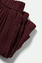 Women's Wandering Short in the color Port - Additional Laydown image