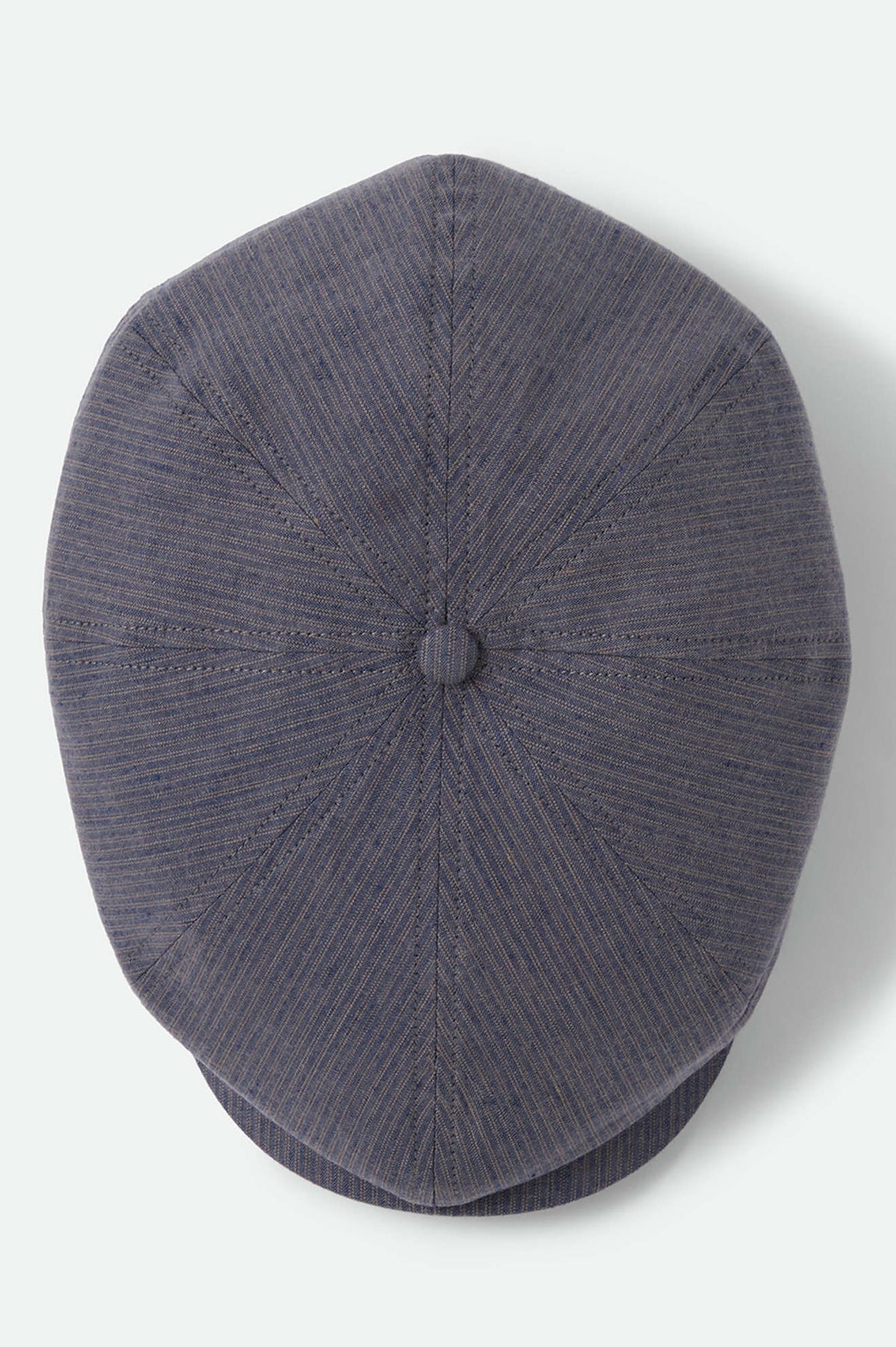 Unisex Brood Newsboy Cap in the color Indigo/Dark Sand - Additional Laydown image