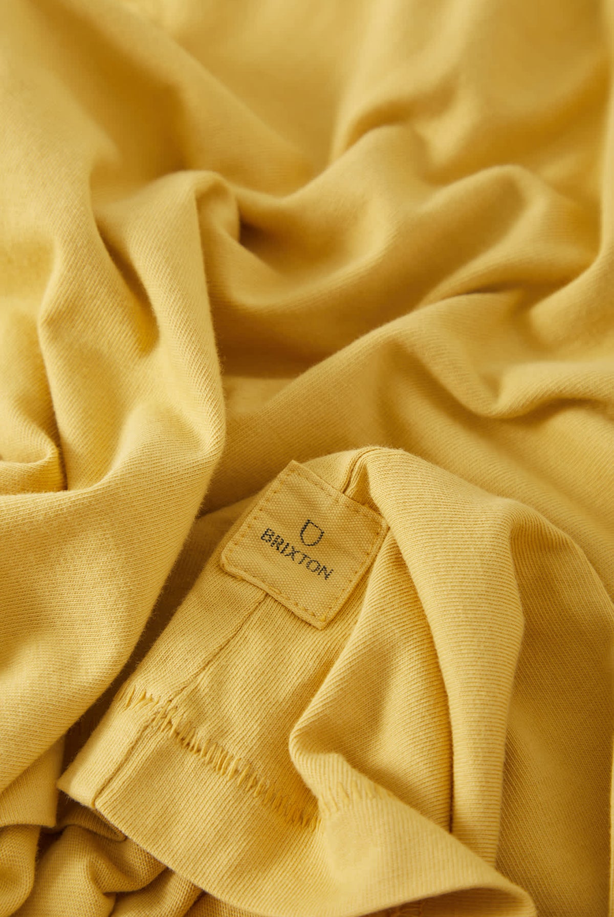 Men's Brixton Baseline Pocket T-Shirt in the color Dusted Ochre Vintage Wash - Additional Laydown image