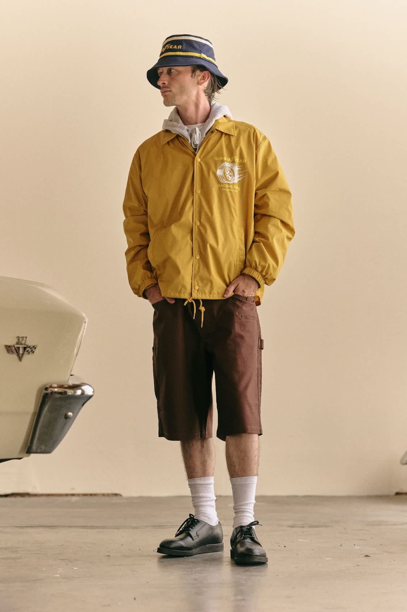 Men's Goodyear Slick Windbreaker in the color Nugget Gold - Men's Front View