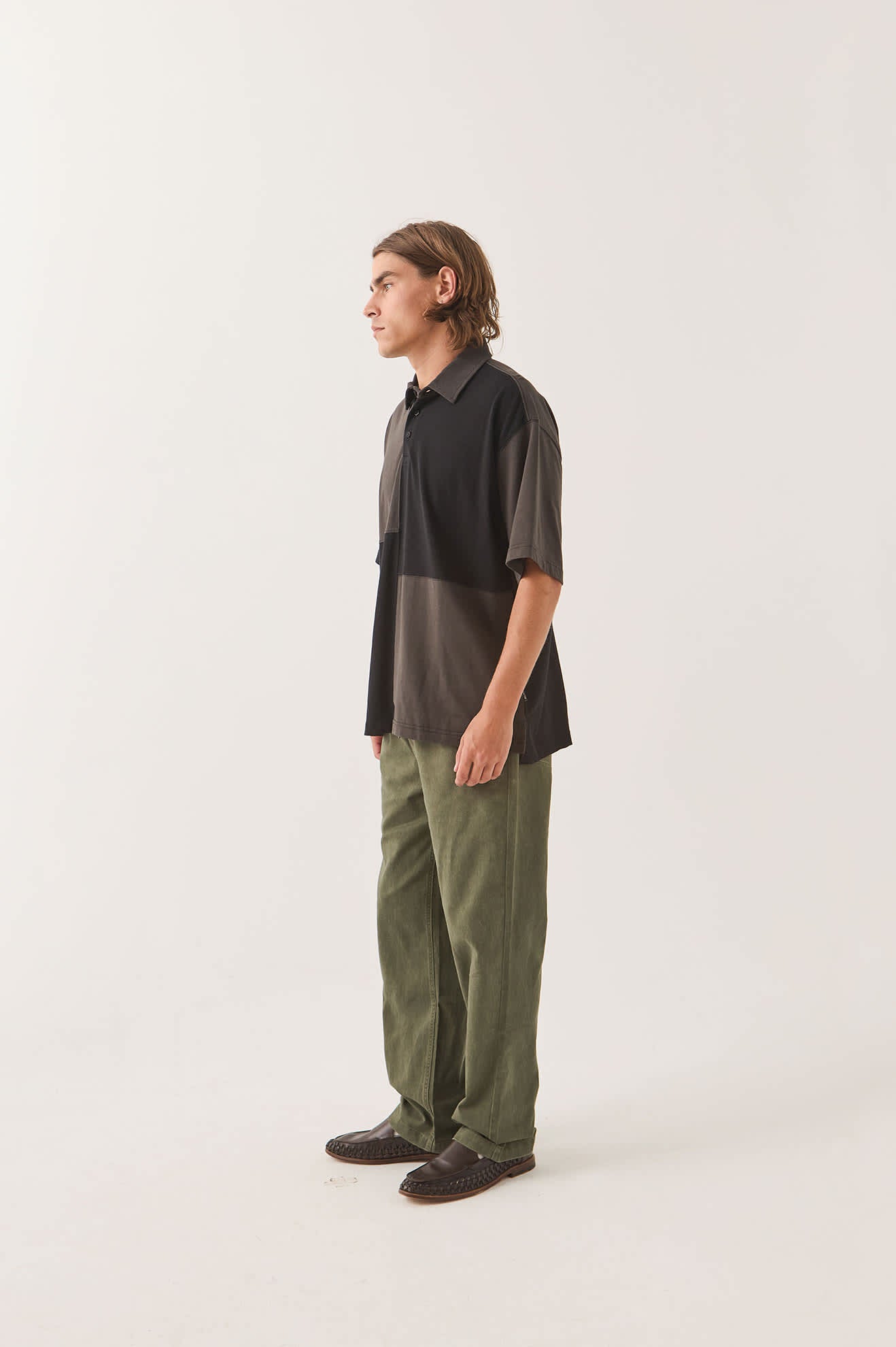 Men's Deco Relaxed Polo T-Shirt in the color Washed Black - Men's Side View