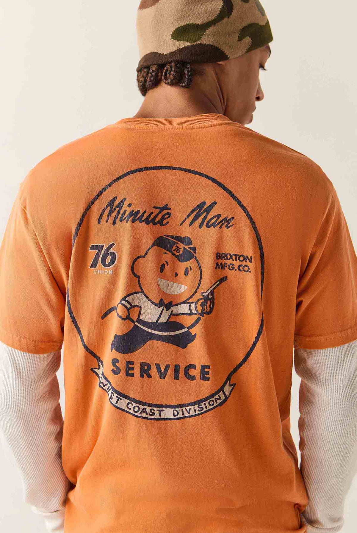 Men's 76 Minute Man Standard T-Shirt in the color Washed Orange - Additional Fit image
