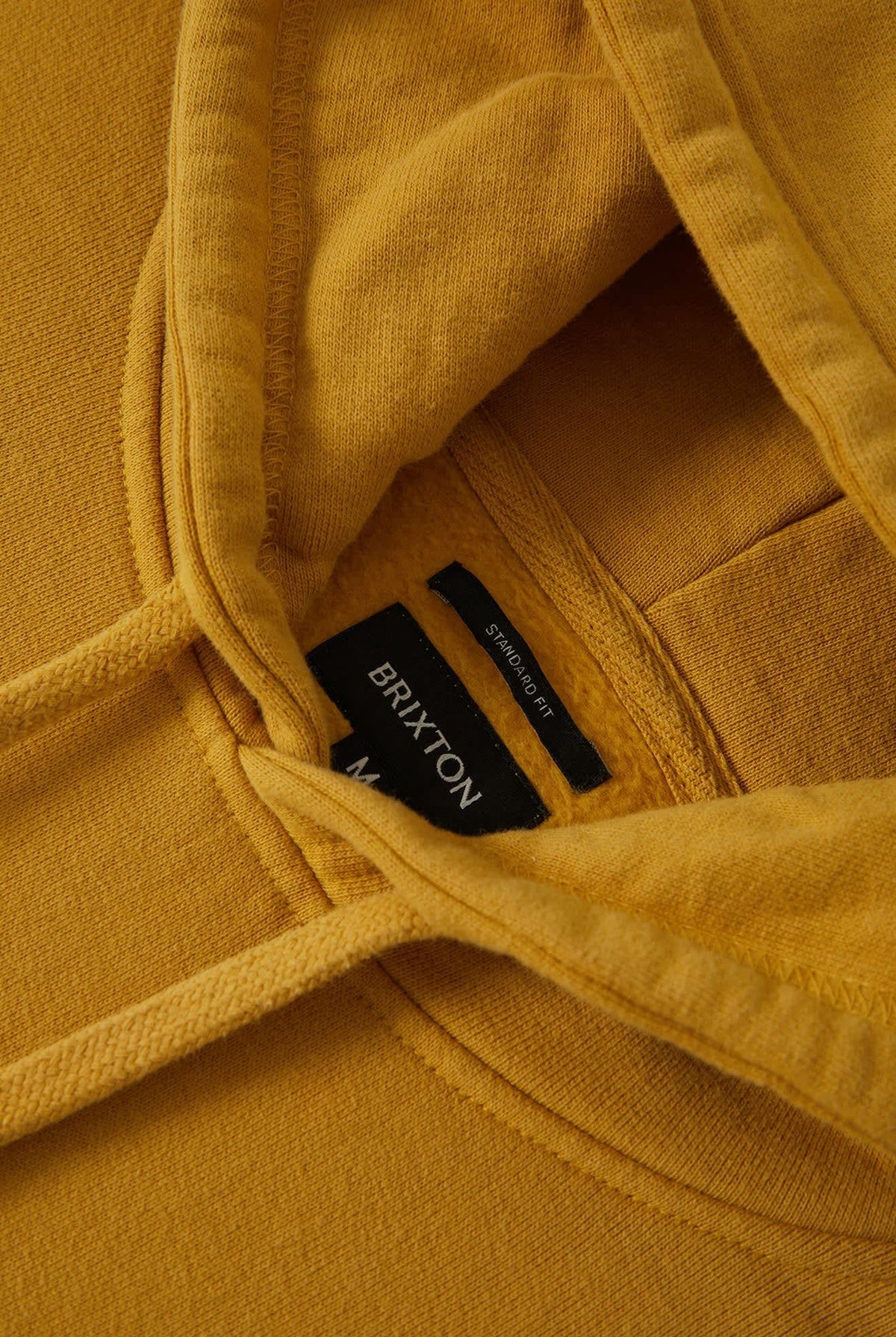 Men's Brixton Baseline Hood Fleece in the color Dusted Ochre Vintage Wash - Additional Laydown image