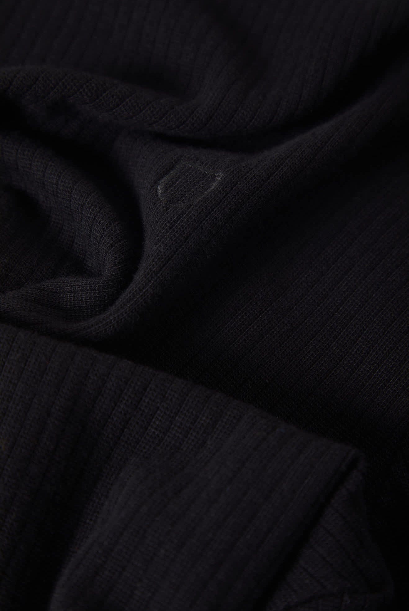 Men's Ribbed City S/S Polo in the color Black - Additional Laydown image