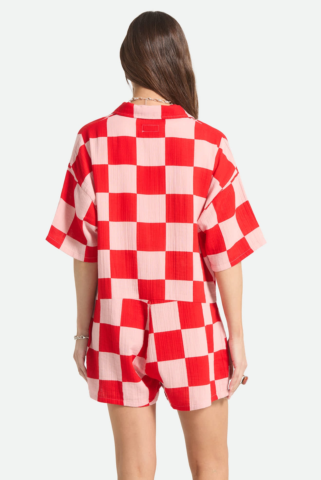 Women's The Getaway Romper in the color Silver Pink/Adrenaline Rush Checkerboard - Women's Back View