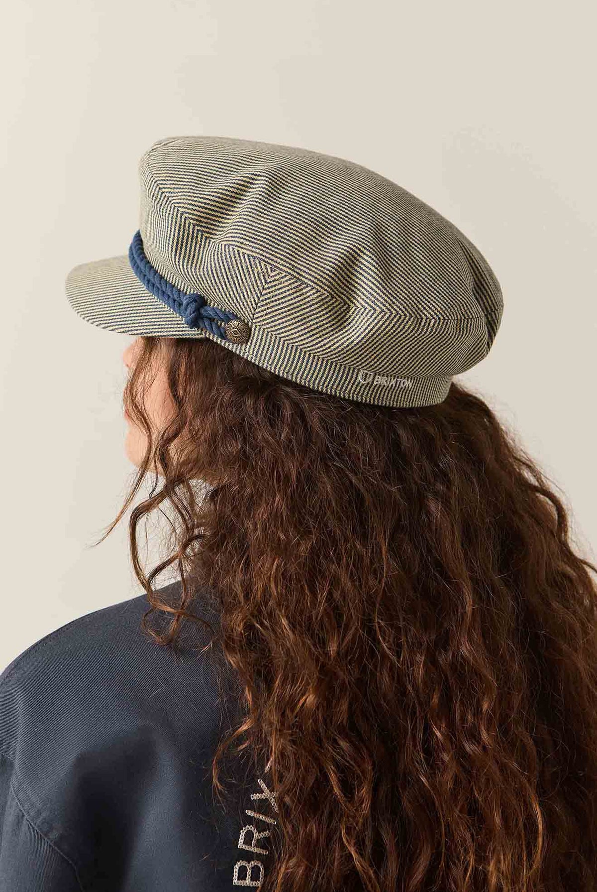 Unisex 76 Fiddler Fisherman Cap in the color Navy/Off White Hickory Stripe - Women's Back View