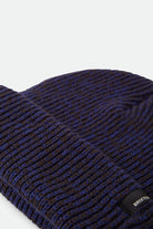Unisex Chunky Heist Beanie in the color Marled Navy/Caramel - Additional Laydown image
