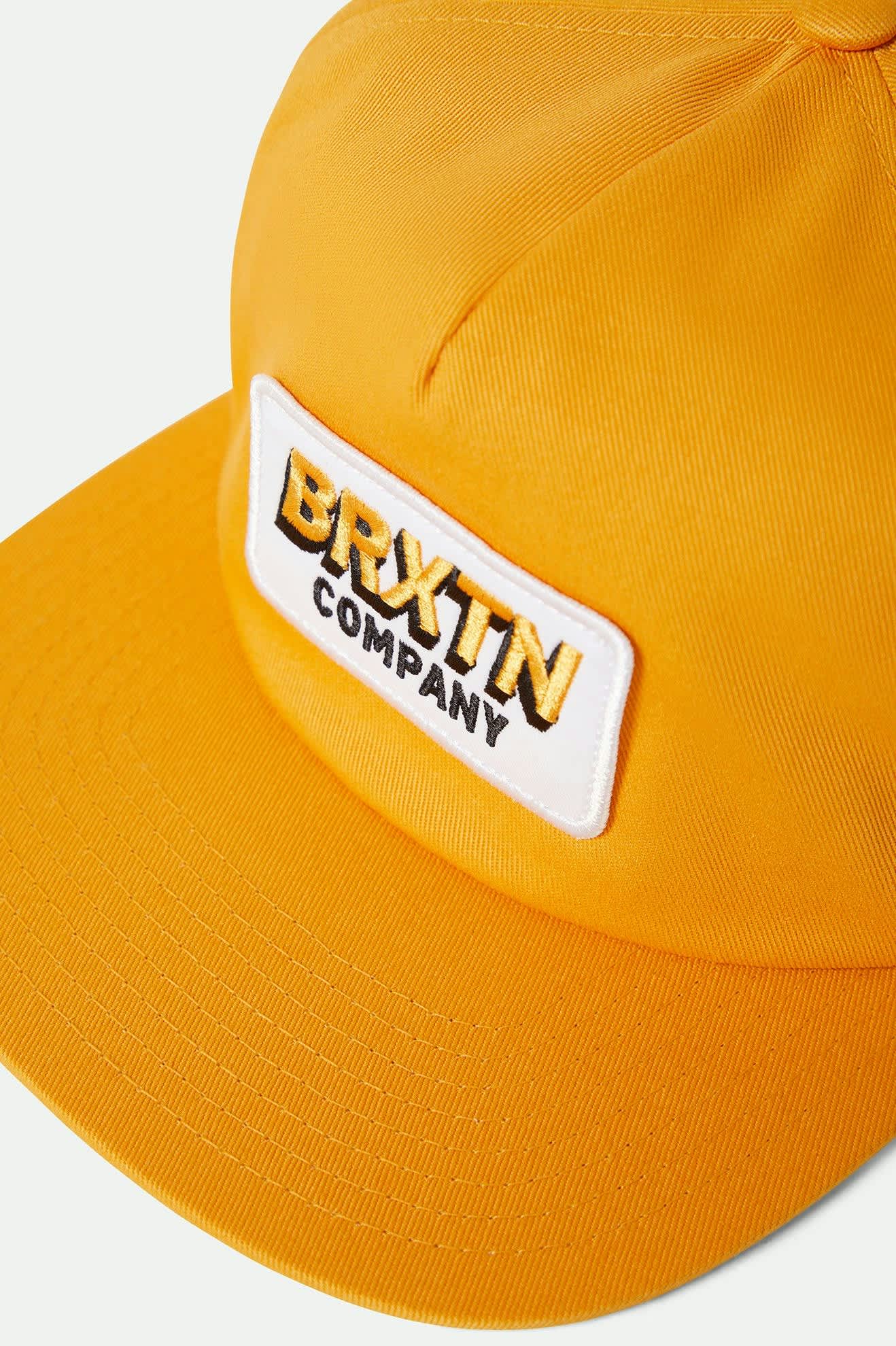 Unisex Payment Snapback in the color Spruce Yellow - Additional Laydown image