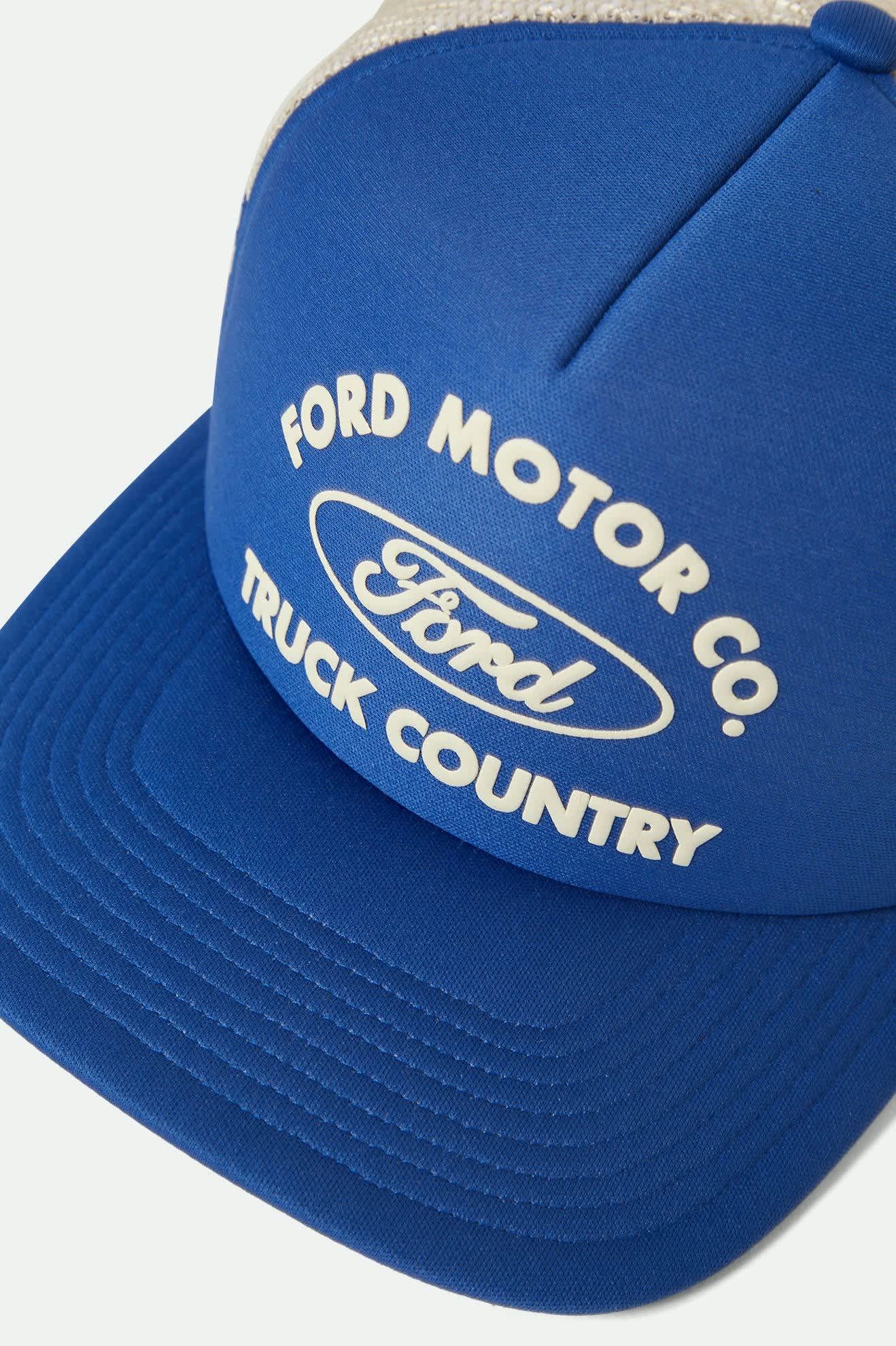 Unisex Ford Built Tough Trucker Hat in the color Ford Blue/Wimbledon White - Additional Laydown image