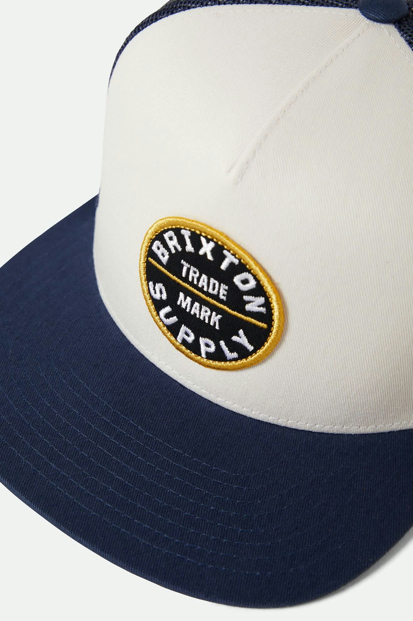 Unisex Oath Trucker Hat in the color Mood Indigo/Off White/Mood Indigo - Additional Laydown image