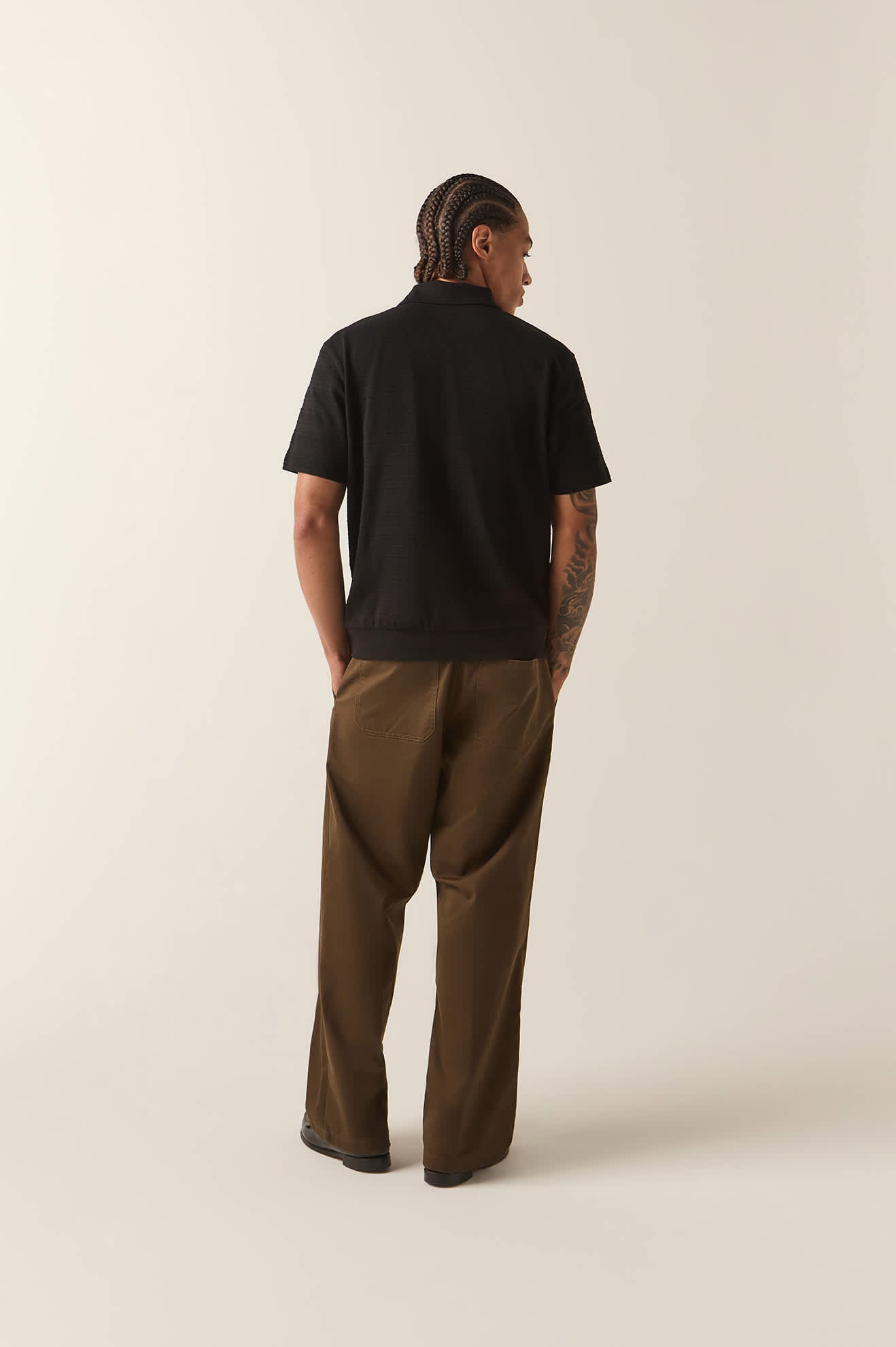 Men's Stereo Polo in the color Black - Men's Back View