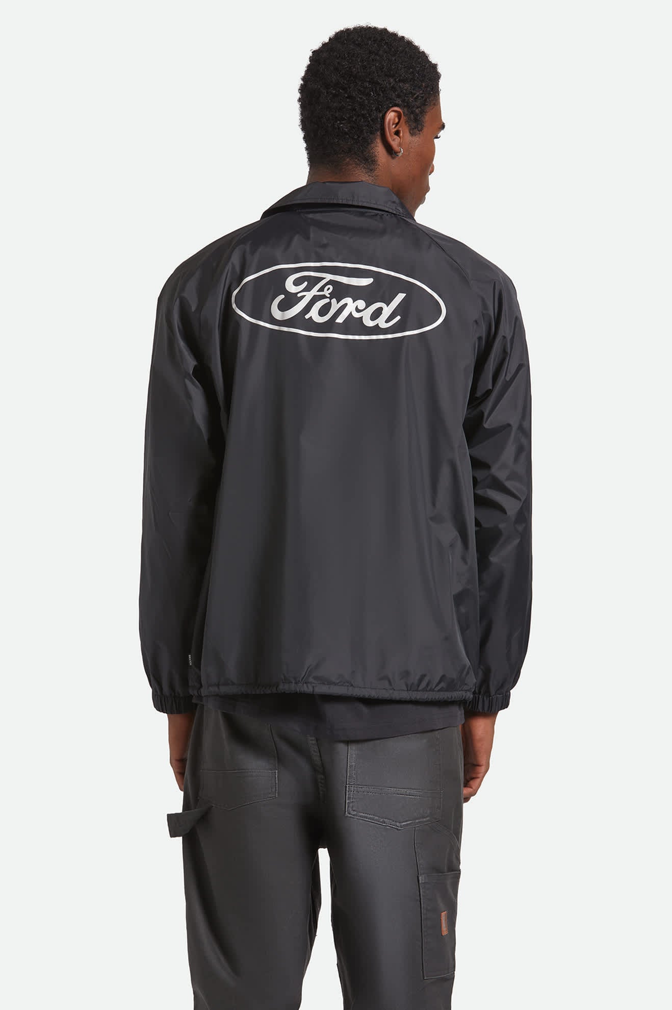 Men's Ford Built Tough Windbreaker in the color Burnt Rubber - Men's Back View