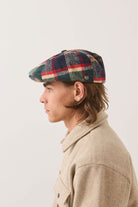 Unisex Brood Newsboy Cap in the color Navy/Green/Red/Cream - Men's Side View