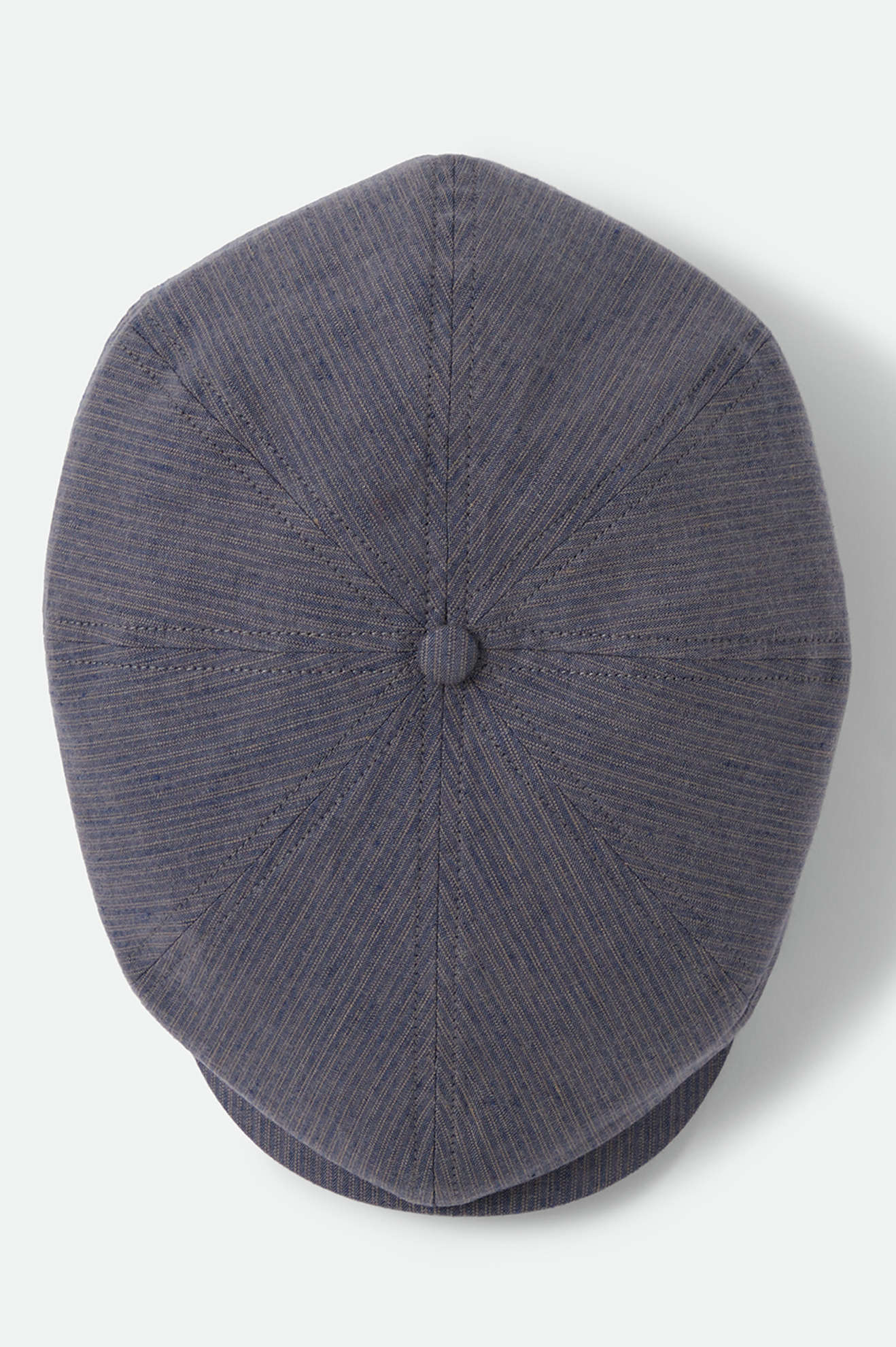Unisex Brood Newsboy Cap in the color Indigo/Dark Sand - Additional Laydown image
