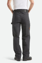 Men's Builders Carpenter Stretch Pant in the color Washed Black - Men's Back View