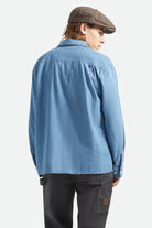 Men's Waylon Lightweight Overshirt in the color Medium Wash Chambrey - Men's Back View