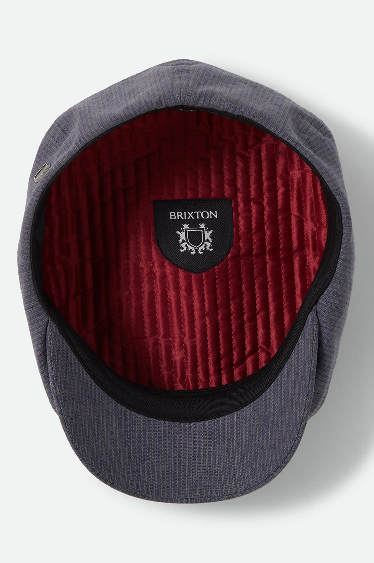 Unisex Brood Newsboy Cap in the color Indigo/Dark Sand - Additional Laydown image
