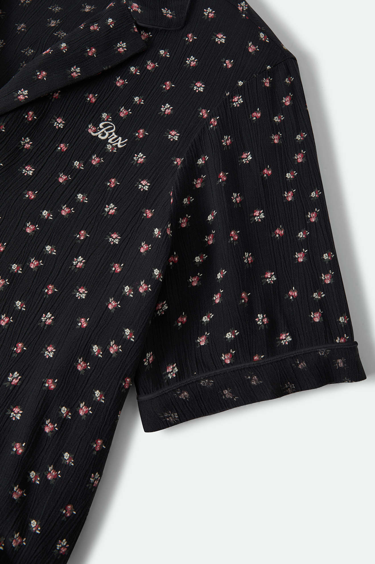 Women's Silky Bowling Button Down Shirt in the color Black Ditsy Floral - Additional Laydown image