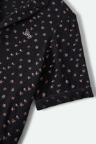 Women's Silky Bowling Button Down Shirt in the color Black Ditsy Floral - Additional Laydown image