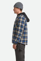 Men's Bowery Quilited Hooded Flannel in the color Navy/Cream - Men's Side View