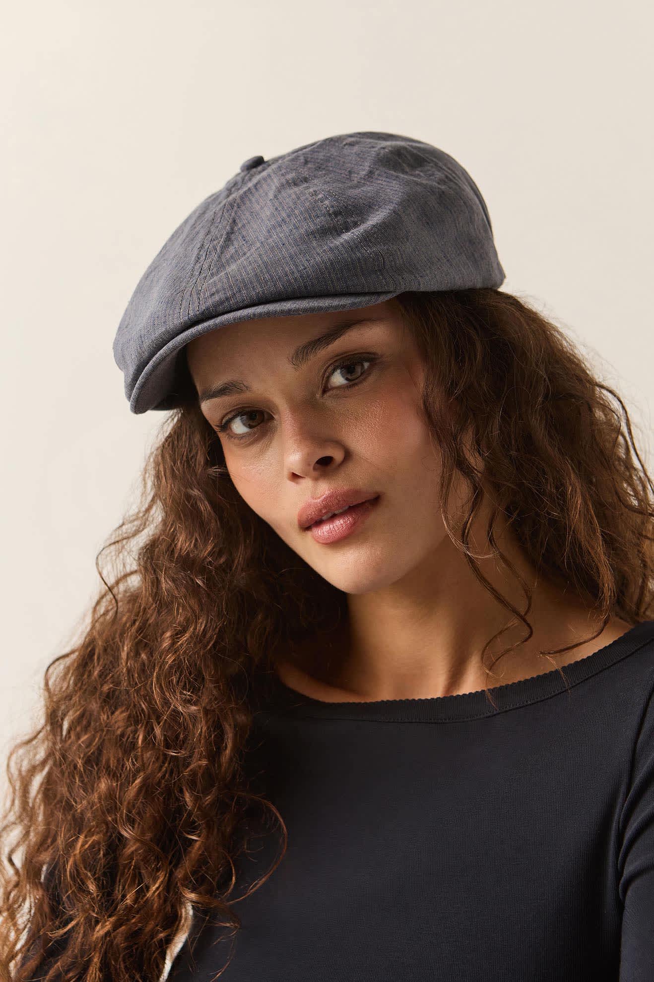 Unisex Brood Newsboy Cap in the color Indigo/Dark Sand - Women's Front View