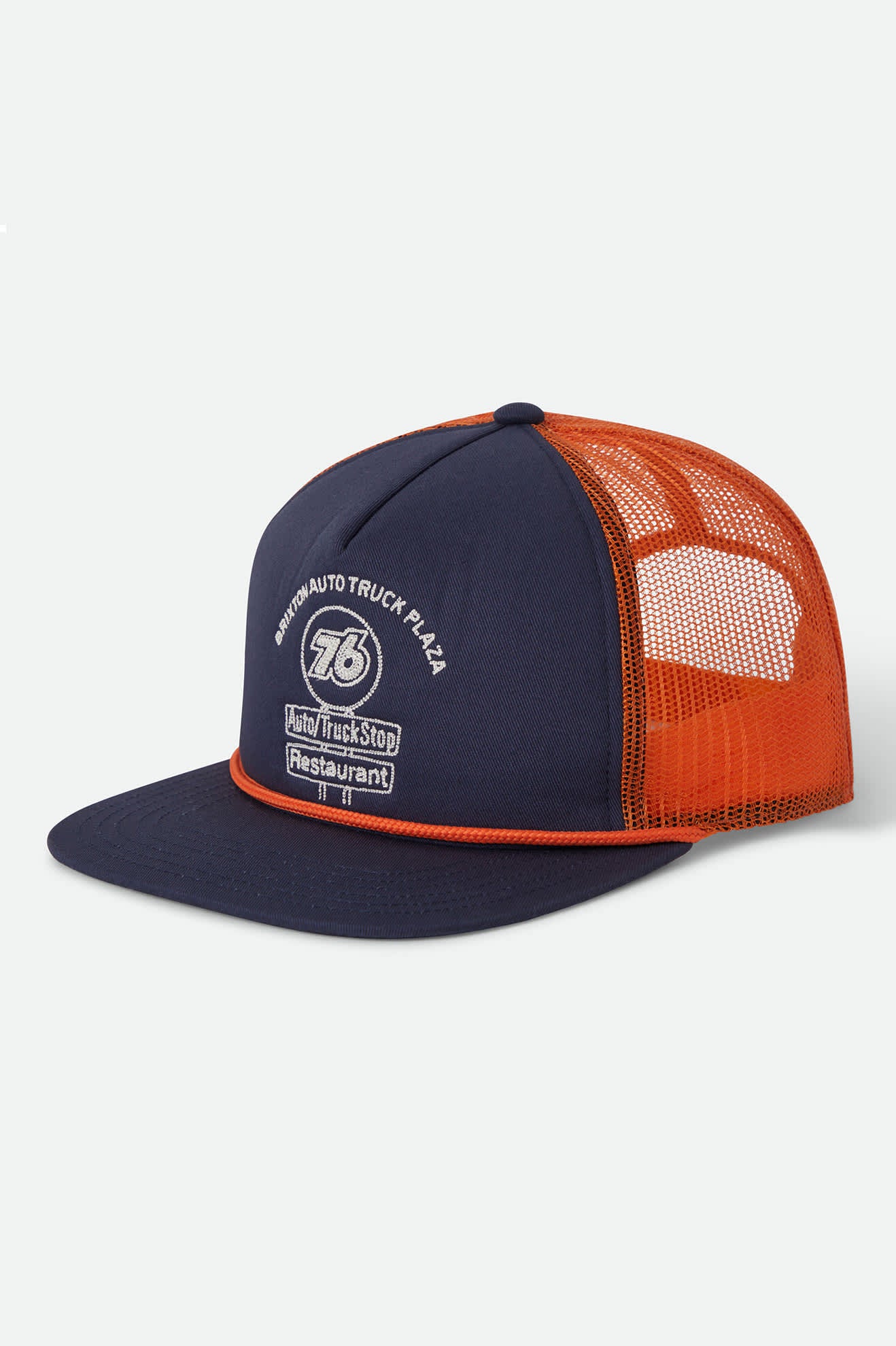 Unisex 76 Truck Stop Trucker Hat in the color Navy/Orange - Front Product View