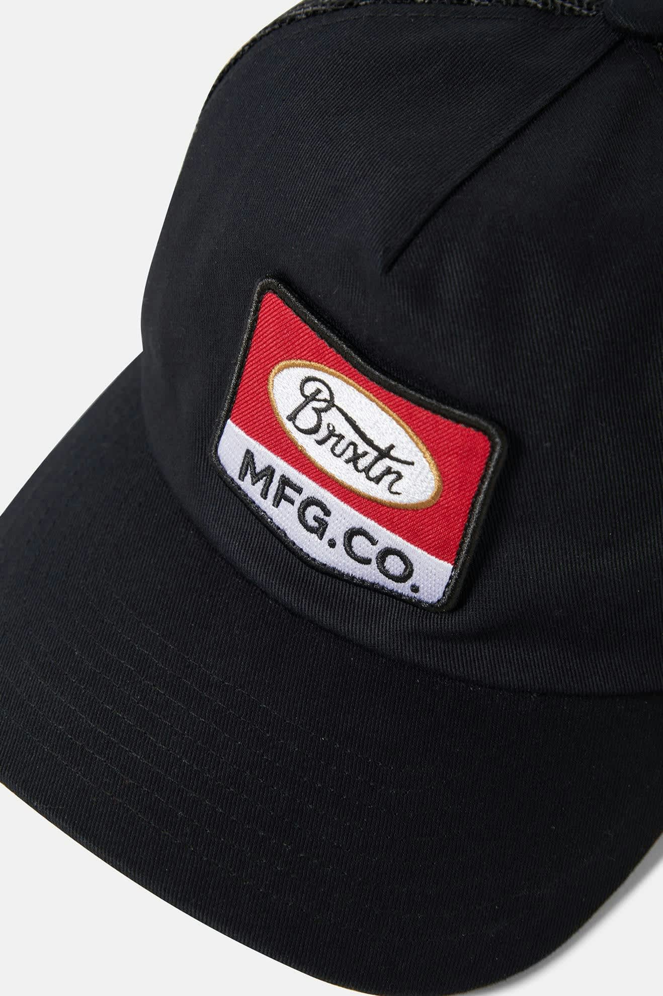 Unisex Phillips Netplus Trucker Hat in the color Black/Black - Additional Laydown image