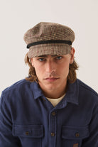 Unisex Fiddler Fisherman Cap in the color Brown/Tan/Red Plaid - Men's Front View