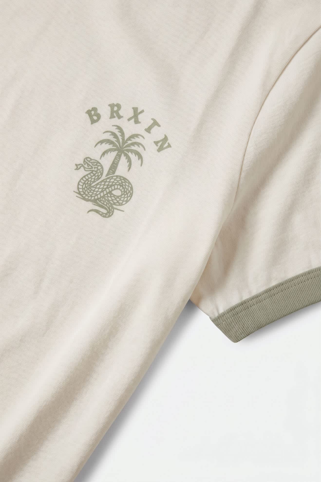 Women's Serpent Baby T-Shirt in the color White/Desert Sage - Additional Laydown image