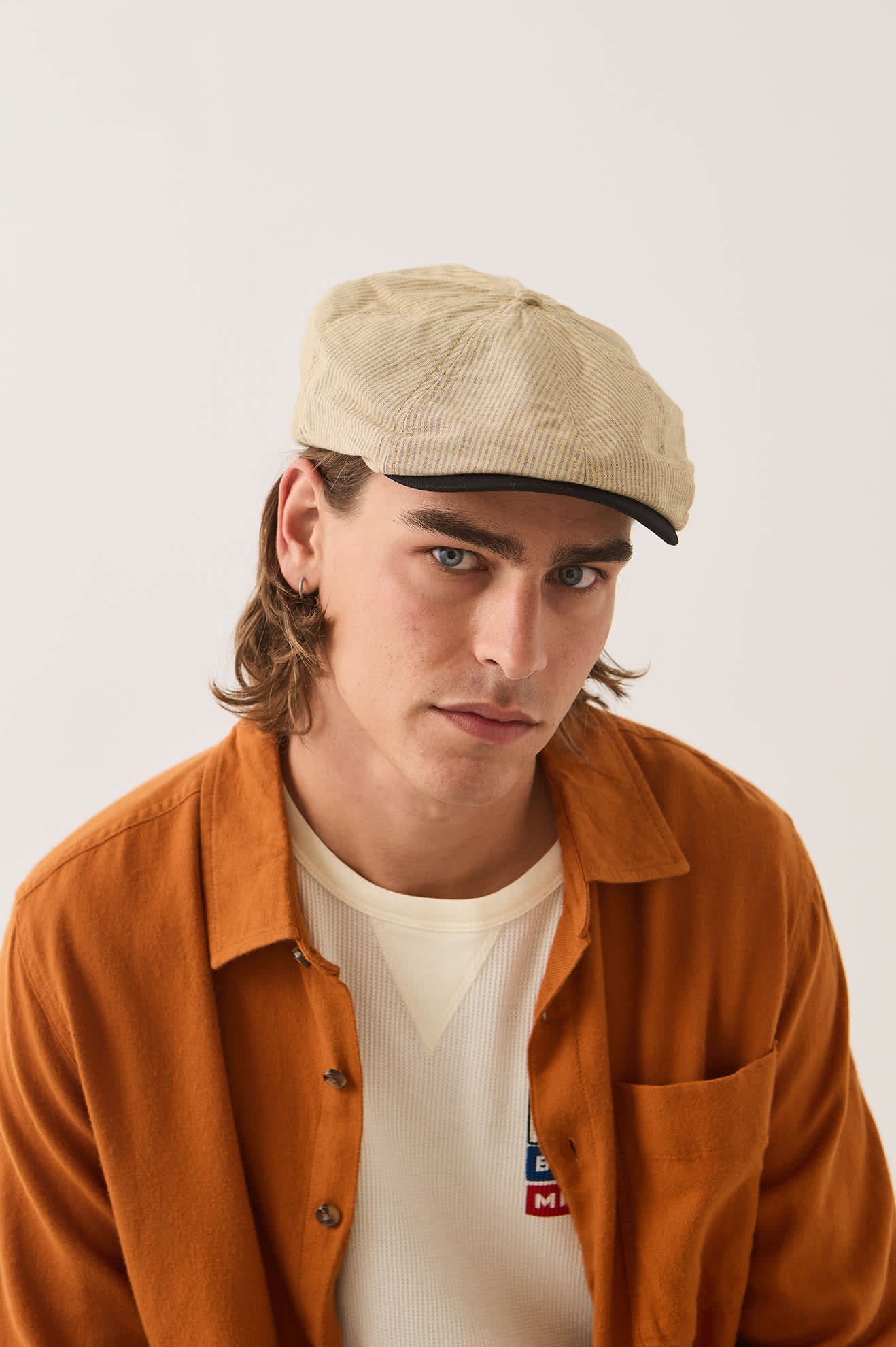 Unisex Hooligan Flat Cap in the color Khaki Stripe/Washed Black - Men's Front View