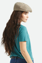 Unisex Brood Newsboy Cap in the color Dusted Ochre/Khaki/Verdant Green - Women's Back View
