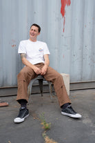 Men's Wing And Wheel Supply Short Sleeve Standard T-Shirt in the color White - Men's Front View