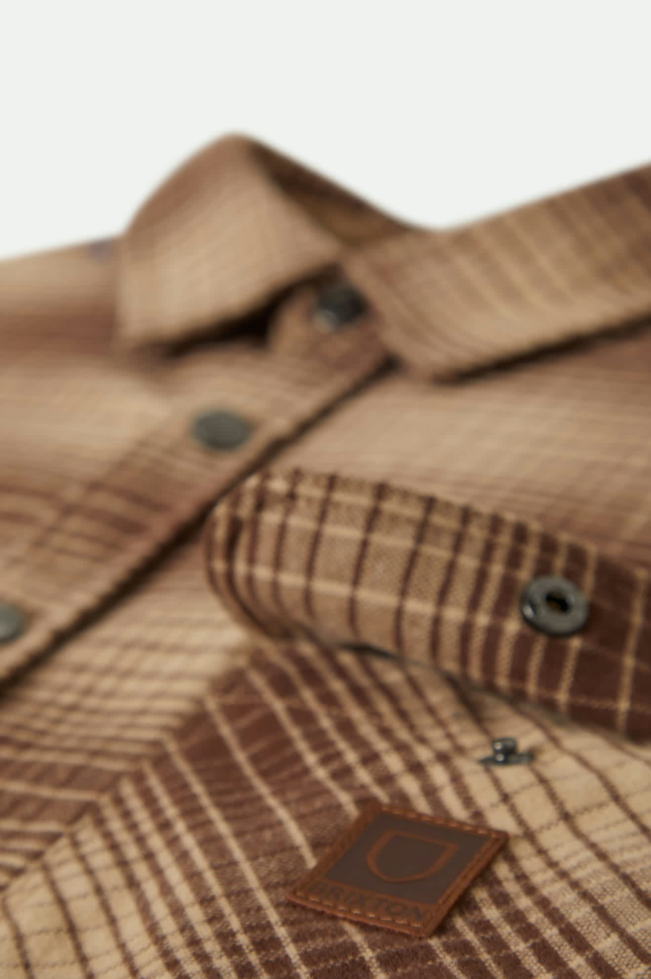 Men's Builders Bowery Stretch Water Resistant L/S Flannel in the color Pine Needle/Sunbaked - Additional Laydown image