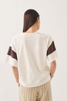 Women's Brixton Boxy Cropped Football T-Shirt in the color Off White - Women's Back View