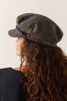 Unisex Fiddler Fisherman Cap in the color Slate Blue/Sepia/Orange - Women's Back View
