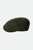 Unisex Brood Newsboy Cap in the color Moss/Orange - Additional Laydown image