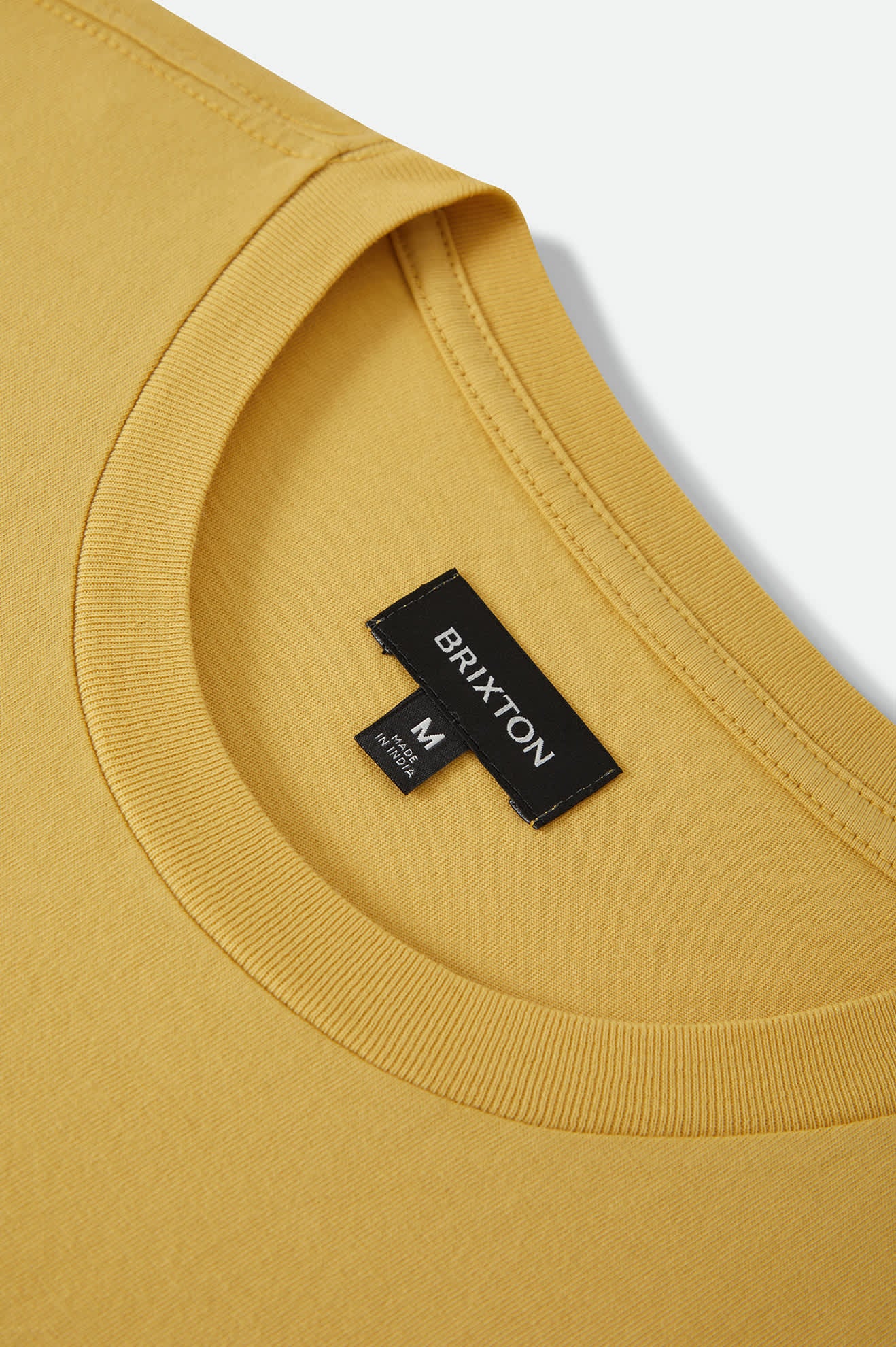 Men's Brixton Baseline Pocket T-Shirt in the color Dusted Ochre Vintage Wash - Additional Laydown image