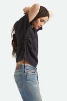 Women's Carefree Organic Garment Dye Cinch T-Shirt in the color Black - Additional Fit image