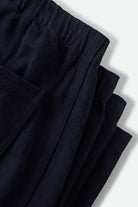 Women's Utility Everyday Barrel Pant in the color Washed Navy - Additional Laydown image