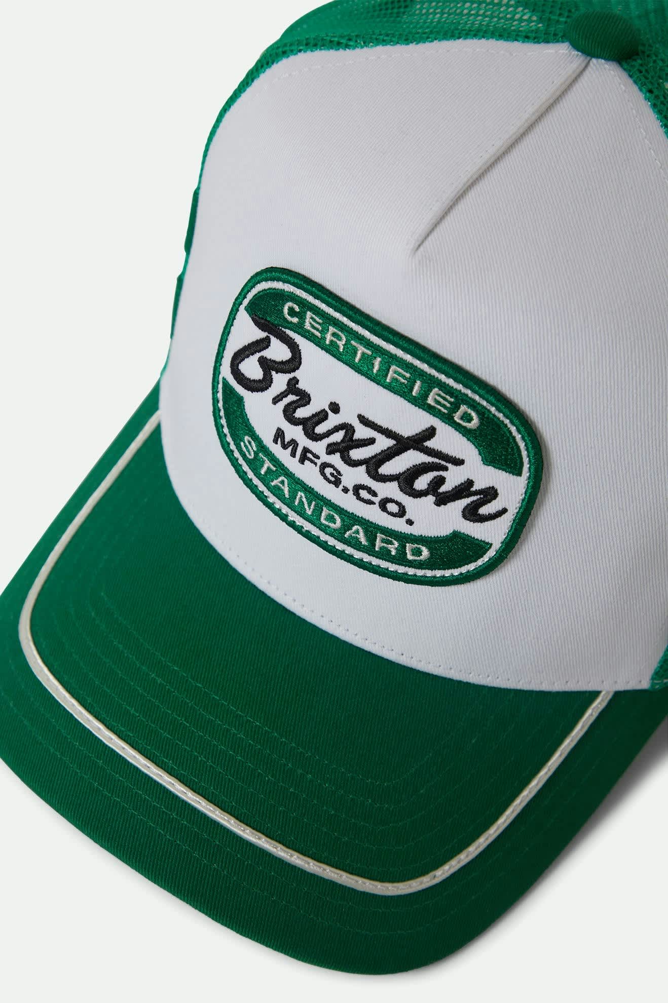 
       Unisex Copley Netplus Trucker Hat in the color Green/White - Additional Laydown image
     