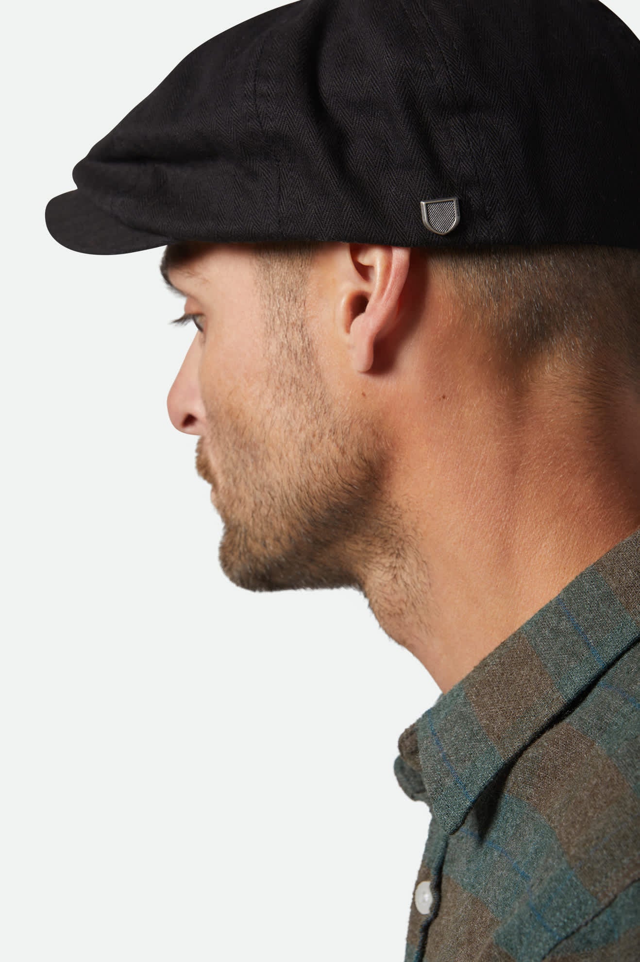 
       Unisex Brood Newsboy Cap in the color Black - Men&#39;s Side View
     