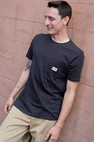 Men's Woodburn Short Sleeve Tailored Pocket T-Shirt in the color Black - Men's Front View