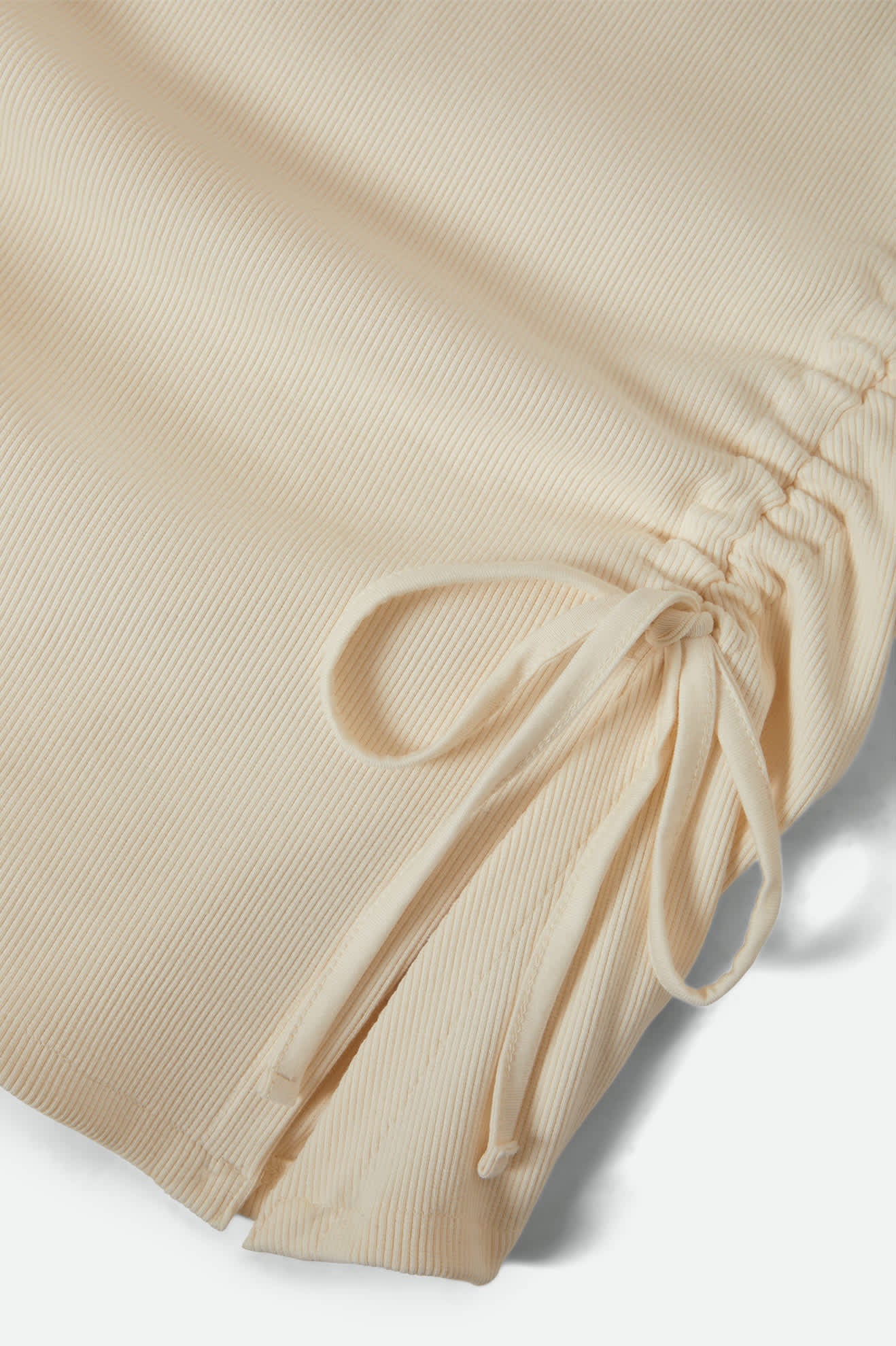 Women's Ribbed Cinch Mini Dress in the color Off White - Additional Laydown image