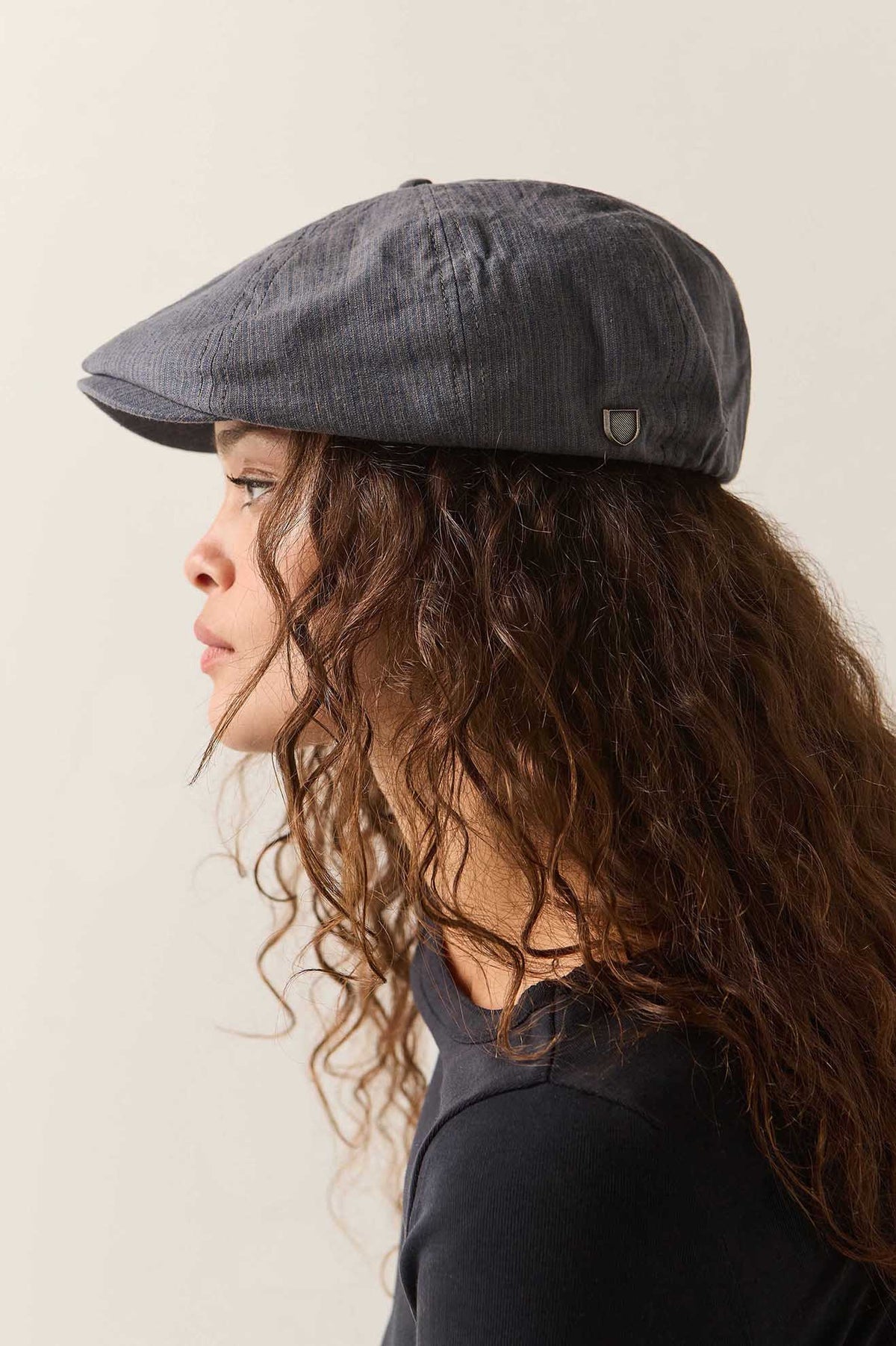 Unisex Brood Newsboy Cap in the color Indigo/Dark Sand - Women's Side View