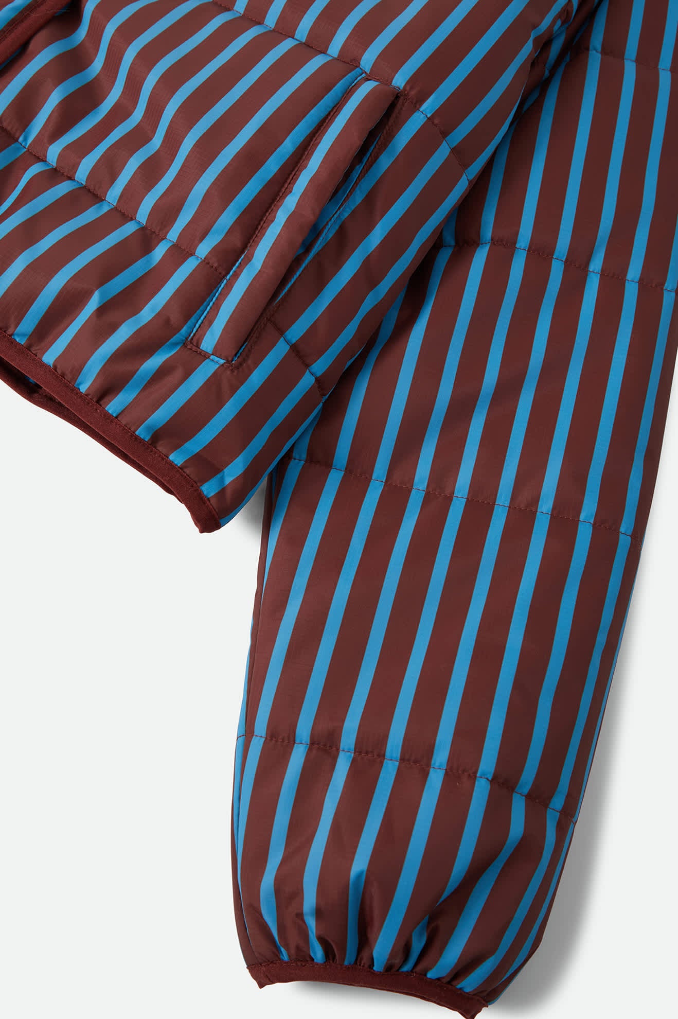 Women's Delilah Mock Neck Jacket in the color Dark Brick/Electric Indigo Stripe - Additional Laydown image
